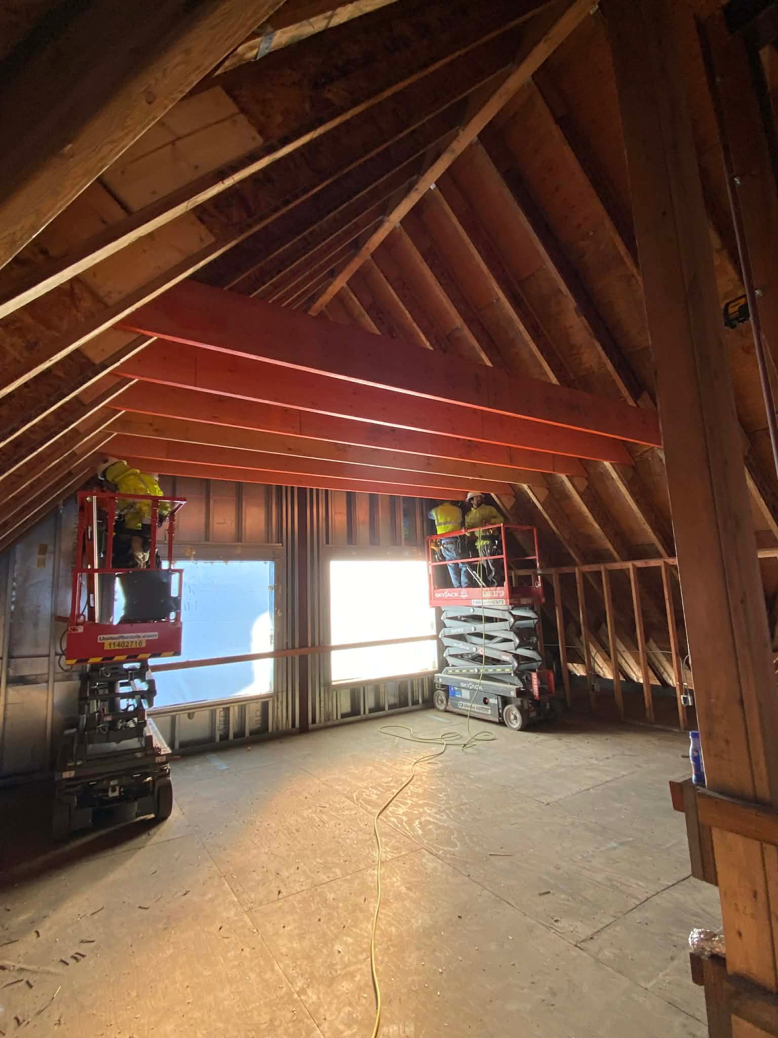 Construction team working on a house